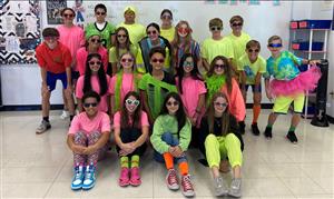 students in bright color shirts